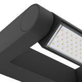 Close-up of the Flirmane LED outdoor wall light in black cast aluminium, showing the cylindrical head and rectangular open frame with integrated LED panel, on a plain white background.