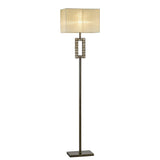The Florence Rectangle 1 Light Crystal Floor Lamp features a brass slim metal stand, a decorative geometric section with crystal accents near the top, and a modern cream rectangular shade. It is dimmable for customizable lighting.