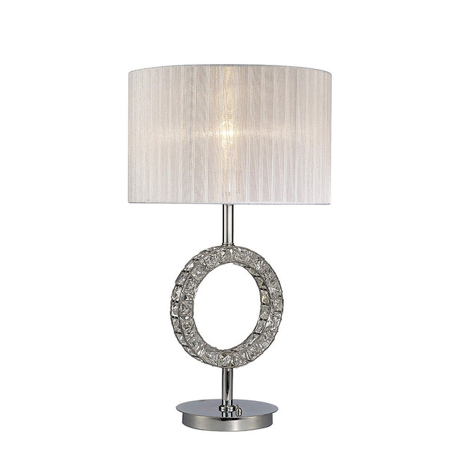 The Florence Round 1 Light Crystal Table Lamp features a modern chrome finish, a decorative textured ring on its circular base, and is topped with a white cylindrical shade for softly diffused light.