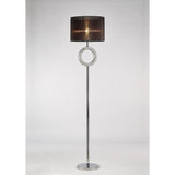 The Florence Round 1 Light Crystal Floor Lamp features a chrome stand, round base, circular crystal accent, and a black semi-transparent drum shade for ambient lighting against a light background.