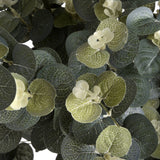 Close-up of Hill Interiors Eucalyptus Spray showing rounded sage green plastic leaves and small cream buds along slender stems.