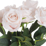 Close-up of Hill Interiors Pastel Pink Tea Rose faux stems showing layered petals and veined green leaves against a white background.