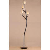 The Forest 4 Light Floor Lamp in Brown & Black Oxide features a dark metal base branching into four curved arms, each with an amber frosted glass flower bud shade, shown against a plain beige background.