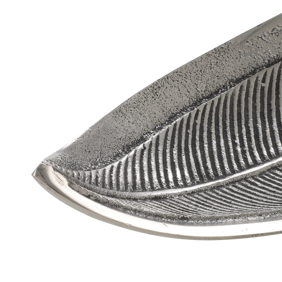 Close-up of the Forleyet Decorative Bowl, a leaf-shaped aluminium dish in antique nickel with embossed rib veining and a speckled textured surface, shown on a white background.