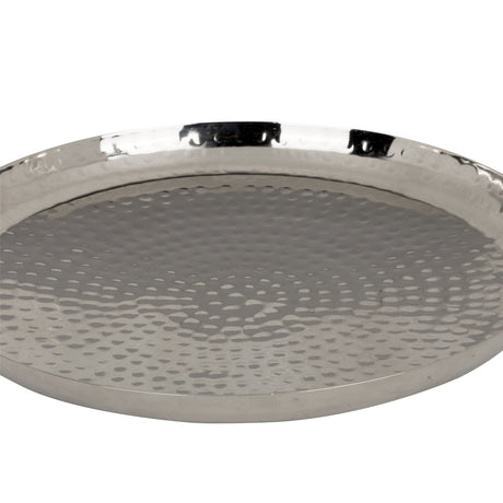 Forleyet Plate 25cm in Nickel, a round, shallow metal plate with a hammered dimpled surface and raised rim, shown in close-up against a white background.