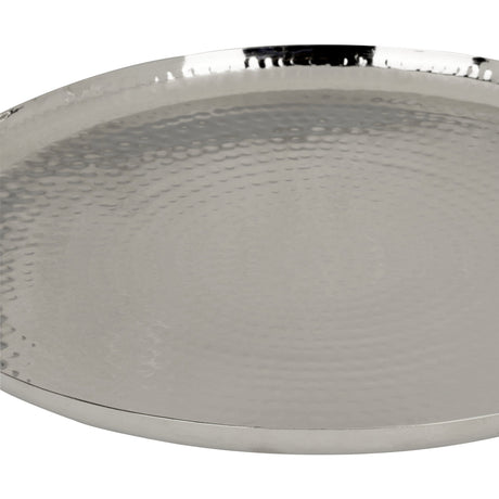 Close-up of the Forleyet Plate 35cm in nickel, a round metal plate with a hammered, dimpled surface and a polished rim, shown against a plain white background.