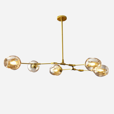 The Tree 5 Light Suspension - Gold chandelier presents a modern luxury design with its elegant gold finish and five round glass bulb covers. Each cover contains a glowing light bulb, gracefully hanging from the ceiling on elongated stems against a simple white backdrop.