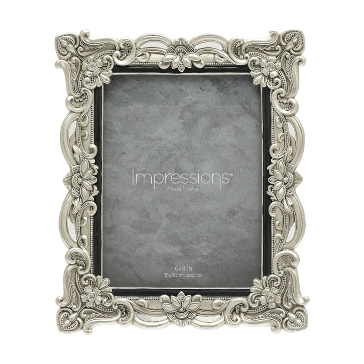 Antique-style rectangular resin photo frame in silver with scrollwork, floral details and crystal accents at each corner, holding a 6x8in photo on a white background.