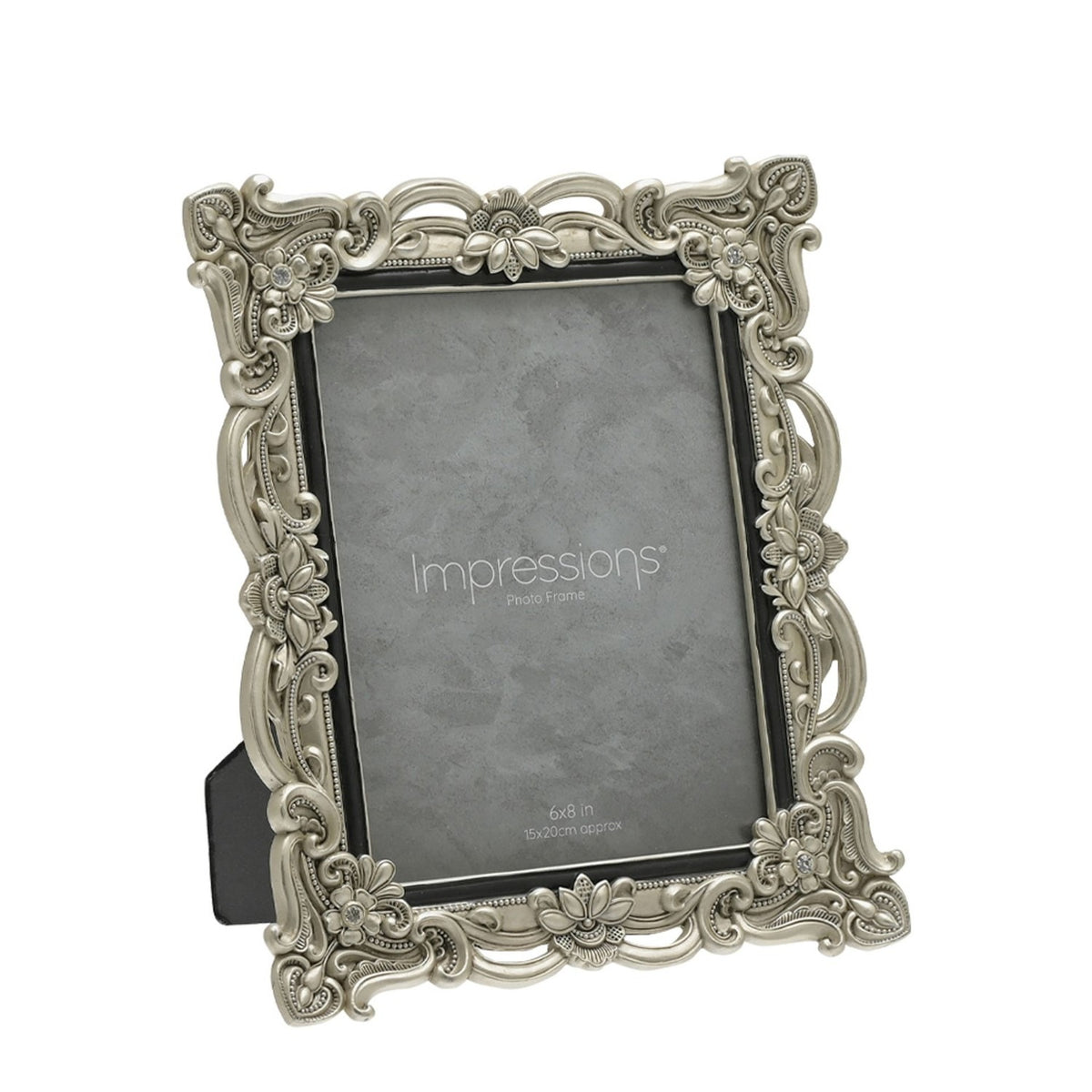 Antique-style silver resin photo frame for a 6x8in photo, with pierced scrollwork, raised flowers, crystal accents at each corner, and a black inner edge, shown on a white background.