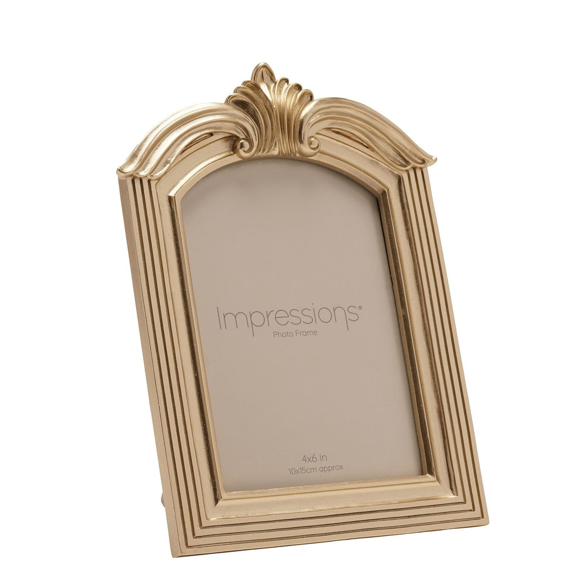 Winged arch photo frame in champagne resin with ridged leaf crest, reeded side mouldings and arched top, shown at an angle on a plain white background.