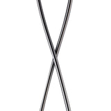 Two pairs of black chopsticks are crossed in the center against a white backdrop, their elegant lines evoking the modern design of the Fragma 4 Light Floor Lamp - Black.