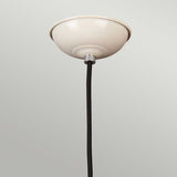 A close-up of the Franklin 1 Light Pendant - Cream showcases its stylish, retro-inspired diner design with a colored spun shade and black cord. The height-adjustable pendant is shown turned off against a light gray background, highlighting its dome-shaped elegance.