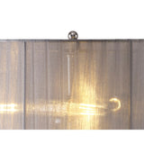 Close-up of the Freida 3 Light Crystal Table Lamp featuring polished chrome, a lit bulb shining through its grey organza shade, and an elegant chrome finial atop the translucent crystal design.