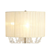 The Freida 3 Light Crystal Table Lamp in French Gold features an ivory cream shade and hanging crystal bead accents, creating a soft, warm glow for a touch of luxury lighting in any room.