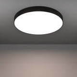 Frelvine Smart LED Flush Ceiling Light 69cm in Black, a round drum fixture with black plastic trim and a white diffuser panel, shown illuminated on a grey ceiling.