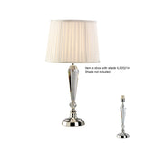 The Freya 1 Light Crystal Table Lamp features a modern silver faceted base. Shown with and without a pleated white shade. Note: Lampshade not included.