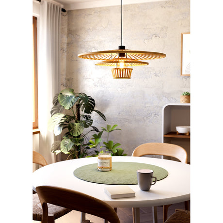 Frimorne wooden pendant light with layered honey-toned wooden slat shade and black steel ceiling rose and cable, hanging above a dining table in a bright room.