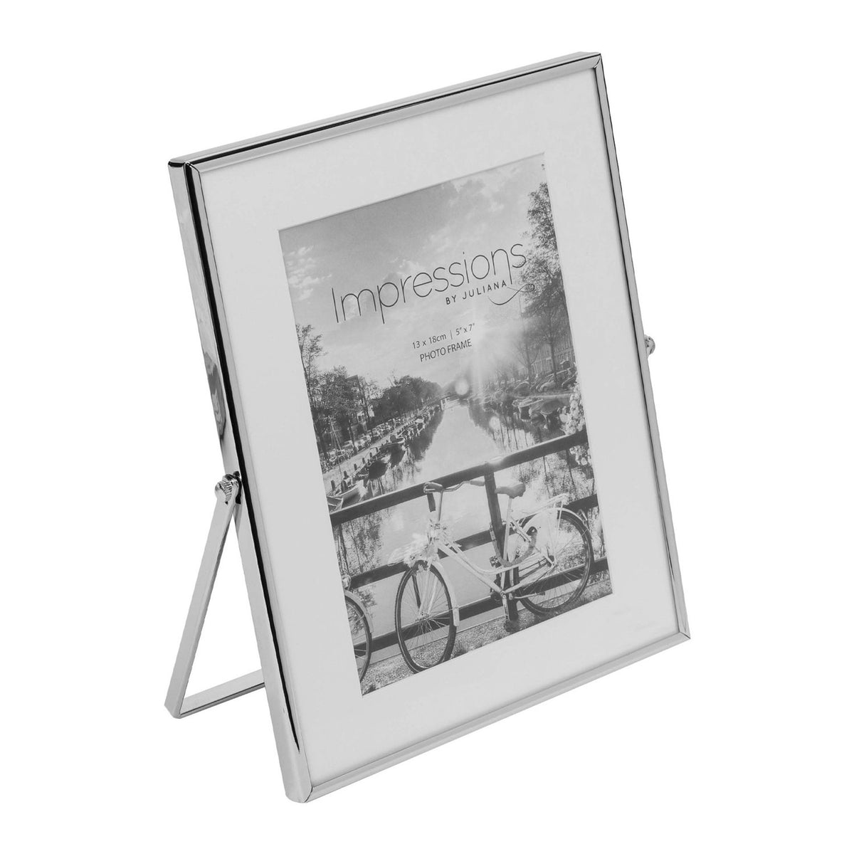 Rectangular photo frame with a slim silver edge and wide white mount around a single opening, shown on its fold-out strut stand against a plain white background.