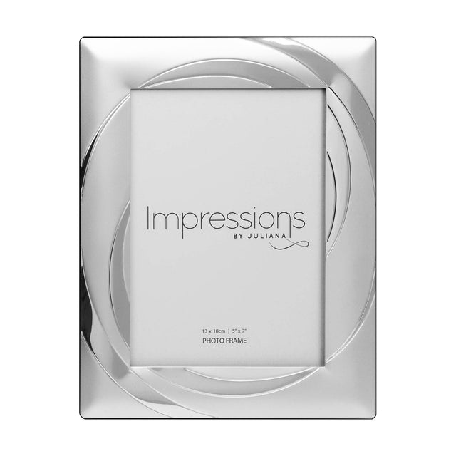 Rectangular silverplated photo frame with two-tone swirl pattern bands in polished and satin silver finishes, holding a 7 x 5in print on a white background.