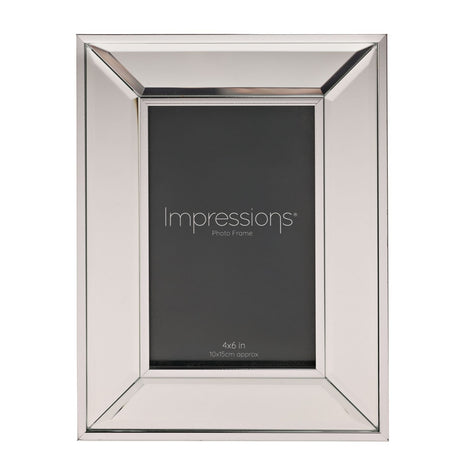 Rectangular photo frame with a bevelled silver mirror glass border, holding a 4x6in insert, shown on a plain white background.