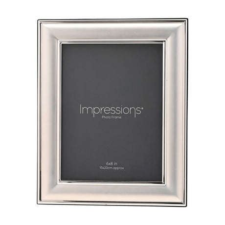 Silverplated rectangular metal photo frame with a broad satin silver band and polished edge lines, holding an 8 x 6in photo, shown on a plain white background.