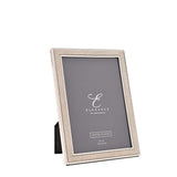 Rectangular photo frame with a champagne faux shagreen border between silver beaded edges, holding a 5 x 7in print, shown on a plain white background.