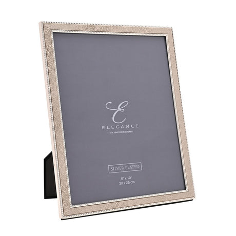 Rectangular photo frame with a pebbled champagne faux shagreen border edged in silver beading, holding a grey insert card, shown on a white background.