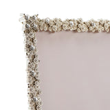 Close-up of the Jewelled Cluster Rectangular Metal Photo Frame in silver, showing floret clusters with beaded centres and clear faceted stones along the border, set against a plain white background.
