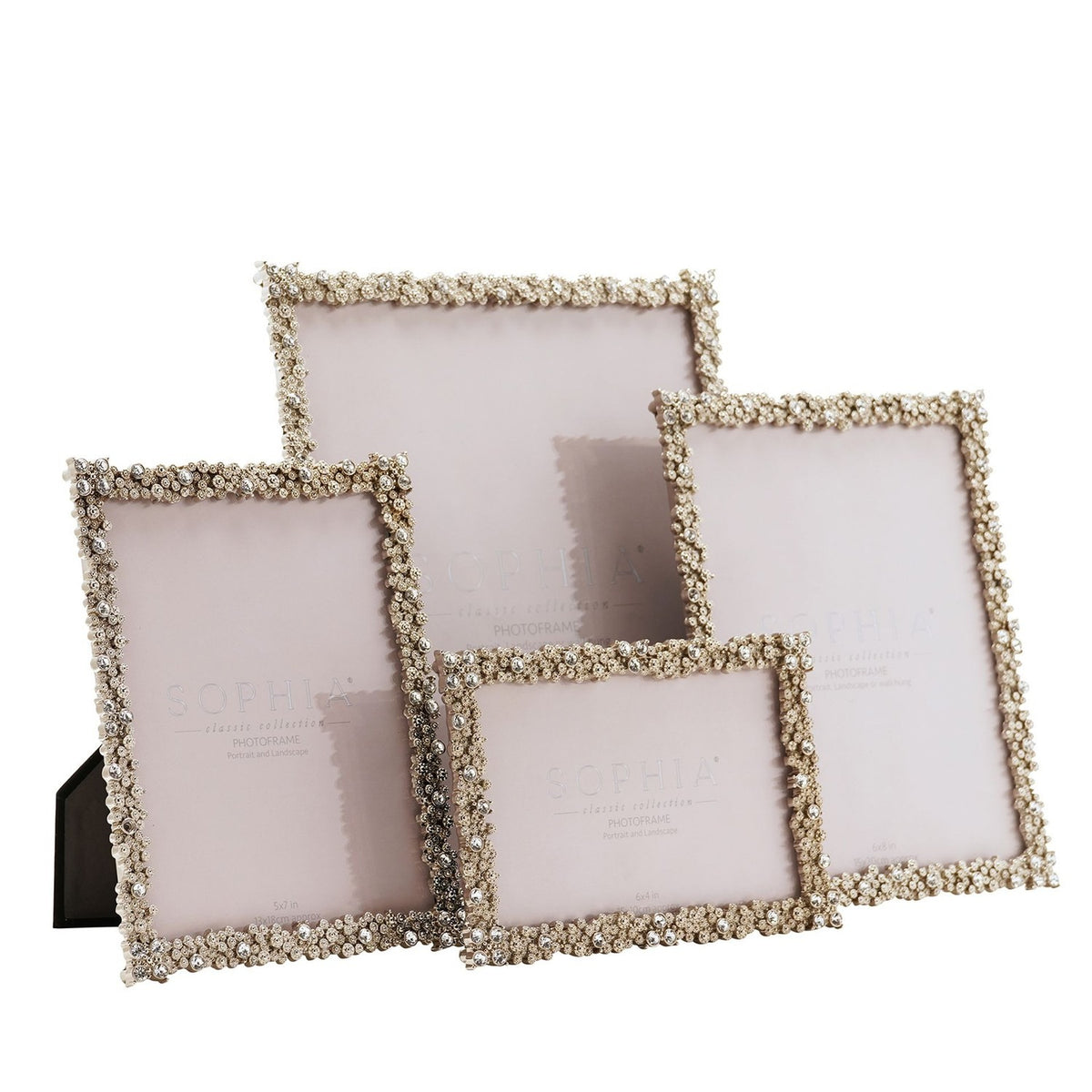 Four rectangular metal photo frames in varying sizes, each with a jewelled silver floret border and clear faceted stones, shown on a plain white background.