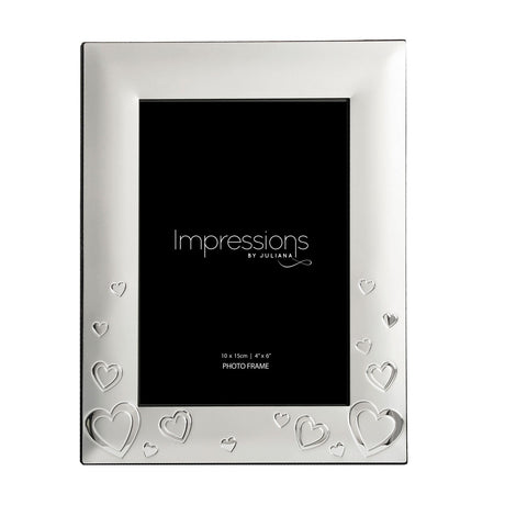 Rectangular silverplated photo frame in satin silver with shiny silver heart outlines and shapes along the base and sides, holding a 4 x 6in photo, shown on a white background.