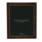 Rectangular photo frame with a brown tortoiseshell-effect surround and gold-tone metal edges, holding an 8x10in photo, shown on a white background.