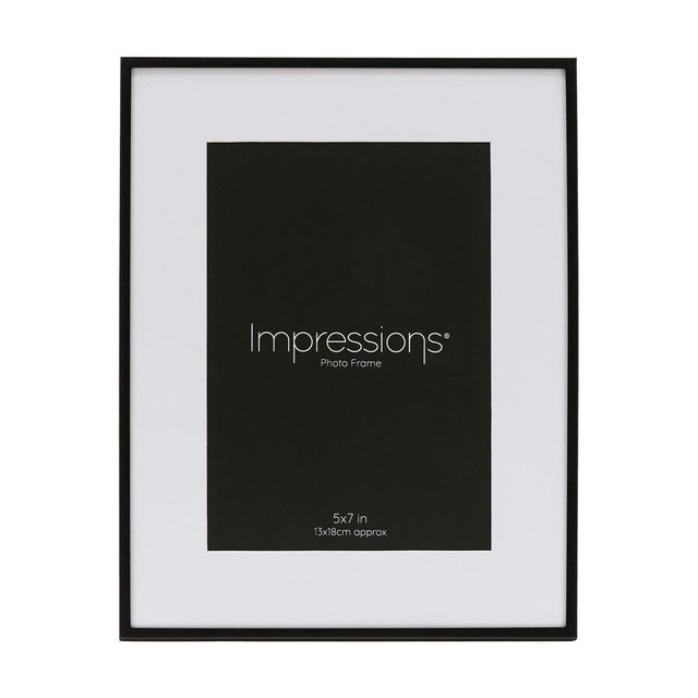 Matt black metal photo frame with white mount, rectangular 7 x 5in window, shown upright on a plain white background.