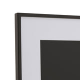 Close-up corner view of the Matt Metal Photo Frame 7 x 5in in black, showing the slim black metal edge, white mount border and rectangular window on a plain background.