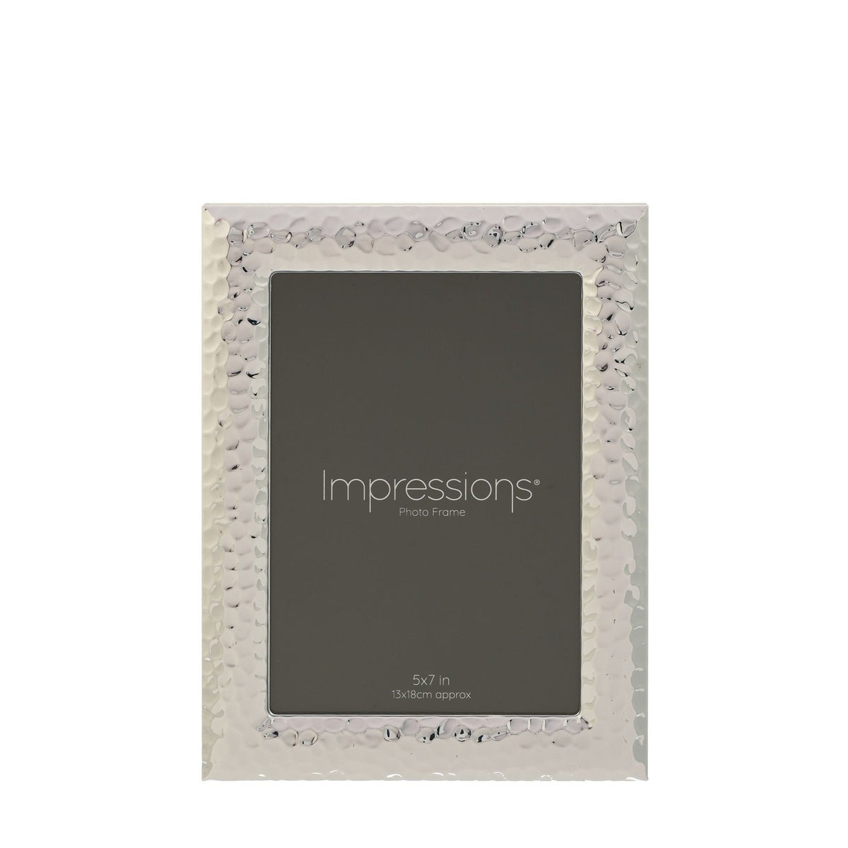Rectangular freestanding photo frame with a textured, hammered silverplate border and smooth bevelled edge, holding a 5x7in print, shown on a plain white background.