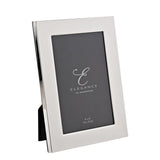 Rectangular shiny silverplated metal photo frame with a broad, mirror-finish border, holding a 4" x 6" sample insert, shown at an angle on a plain white background.