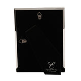 Back of silverplated rectangular photo frame showing black velvet backing, two triangle hanging hooks, and a fold-out stand, on a plain white background.