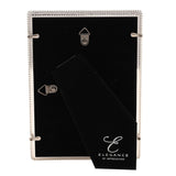 Rear view of the silverplated beaded metal photo frame with black velvet backing, showing two hook hangers, a stand, and an Elegance by Impressions tag.
