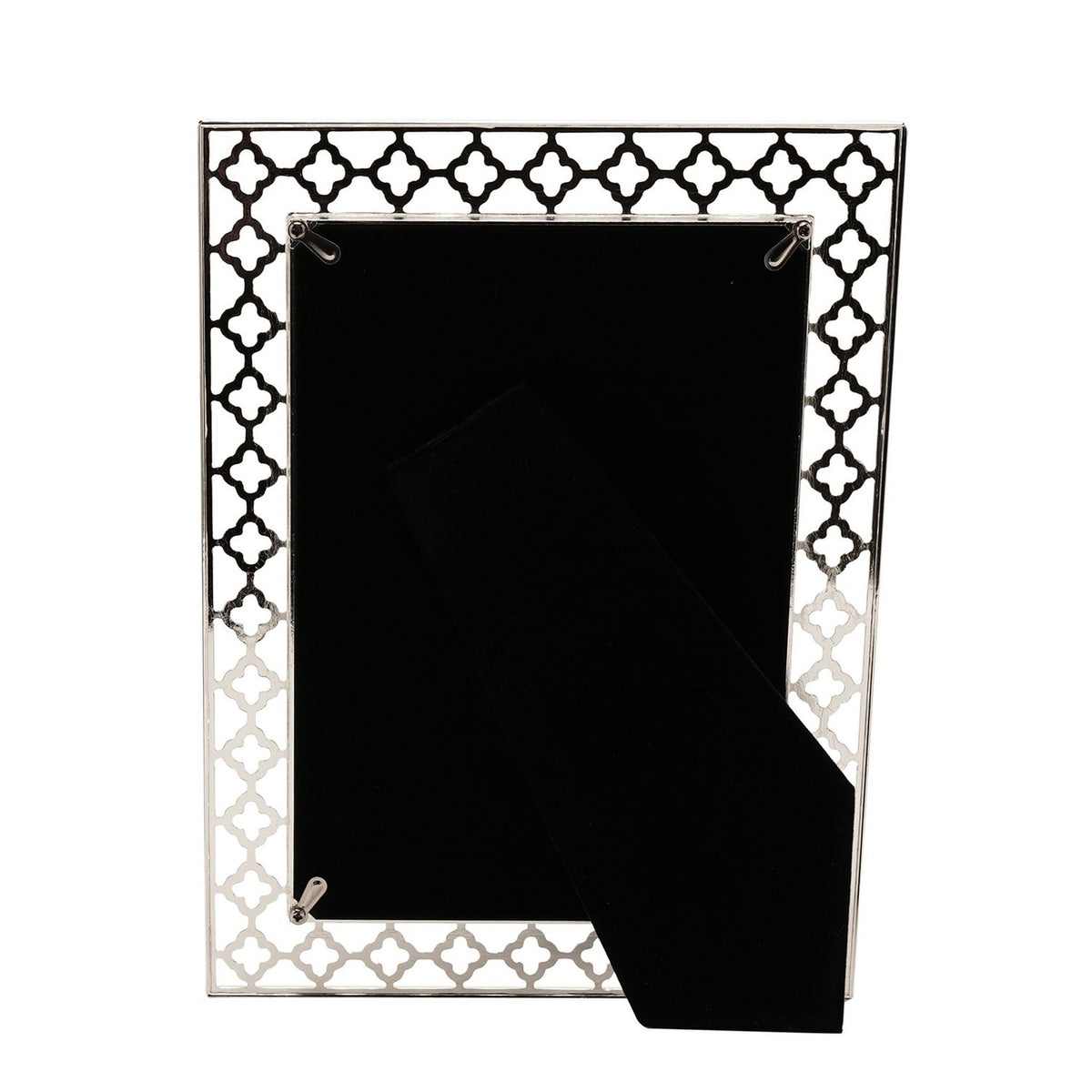 Rectangular 7 x 5in photo frame in silverplated metal with a cut-out lattice border of four-petal shapes, shown rear-facing with velvet-lined easel stand on a white background.