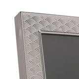 Close-up of the Art Deco Scallop silverplated metal photo frame, showing the raised inner rim and overlapping arc pattern on the silver border.