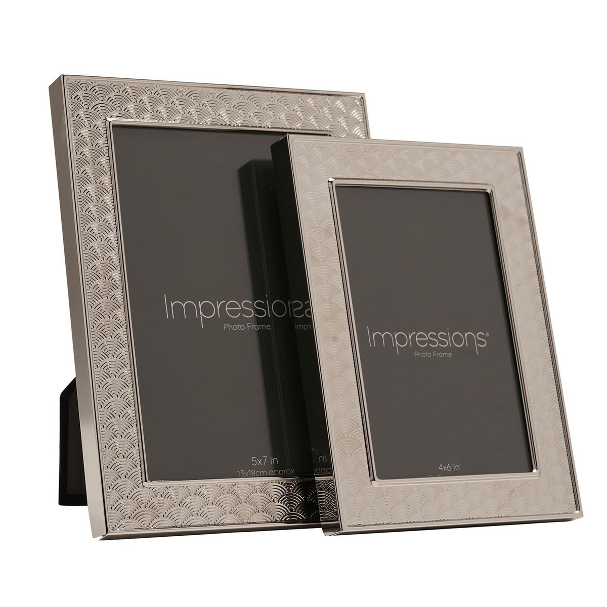 Two silverplated rectangular photo frames with an art deco scallop border pattern, sized 5x7in and 4x6in, standing on a white background.
