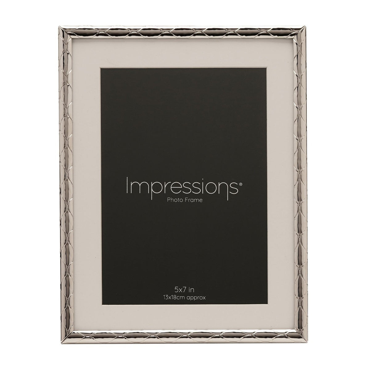 Silver metal photo frame with criss cross patterned border and white mount, holding a 5x7in photo, shown on a plain white background.