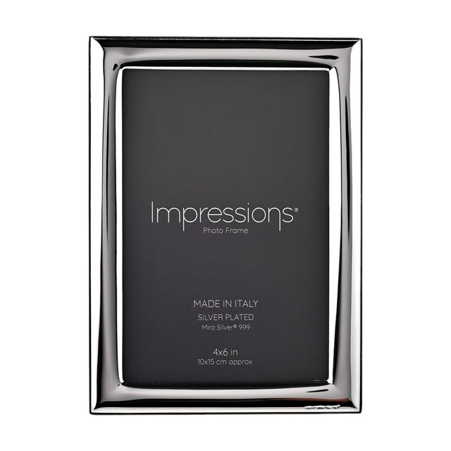 Rectangular silver-plated photo frame with a narrow, smooth polished border and dark insert, holding a 6 x 4in print on a plain white background.