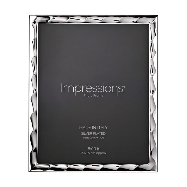 Rectangular wavy bevelled photo frame in silver with a rippled edge border, holding a dark 8x10in insert, shown on a plain white background.
