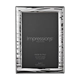 Italian Narrow Wave Photo Frame in silver with rippled wave-textured border, rectangular 6 x 4in window and wood back, shown on a plain white background.