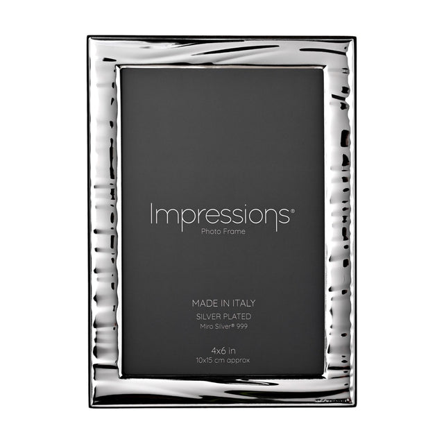 Italian Narrow Wave Photo Frame in silver with rippled wave-textured border, rectangular 6 x 4in window and wood back, shown on a plain white background.