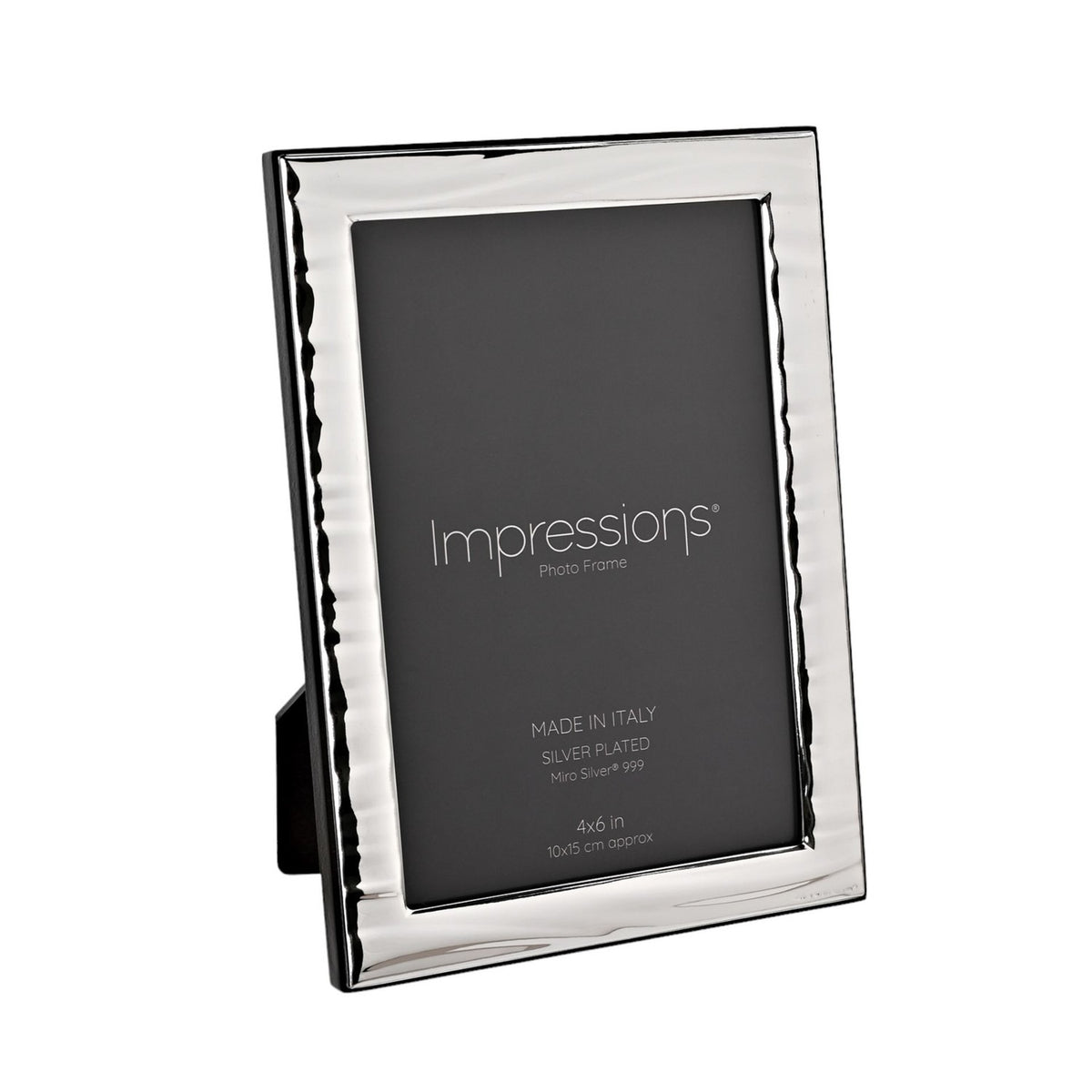 Rectangular silver-plated photo frame with a narrow rippled wave border, displayed at an angle on a plain white background, holding a 4 x 6in print.