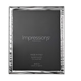 Silverplated Narrow Wave Photo Frame in rectangular shape with rippled silver border and wood back, holding a 10 x 8in print on a plain white background.