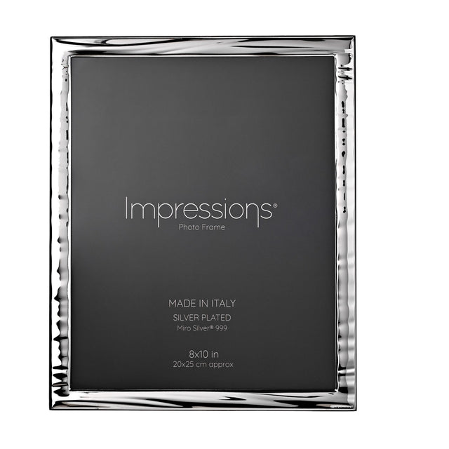 Silverplated Narrow Wave Photo Frame in rectangular shape with rippled silver border and wood back, holding a 10 x 8in print on a plain white background.