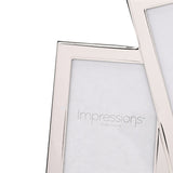 Close-up of the Overlapping Multi Aperture Photo Frame in silver-plated metal, showing angled rectangular openings with clean flat borders against a white background.