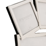 Close-up of an overlapping multi-aperture photo frame in shiny silver metal, showing tilted square openings with black velvet backing, on a white background.